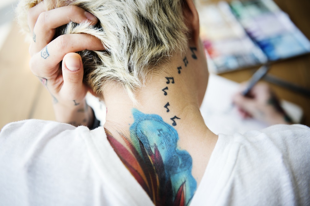 The 7 Tattoos That Attract The Most Positive Energy, According To Experts